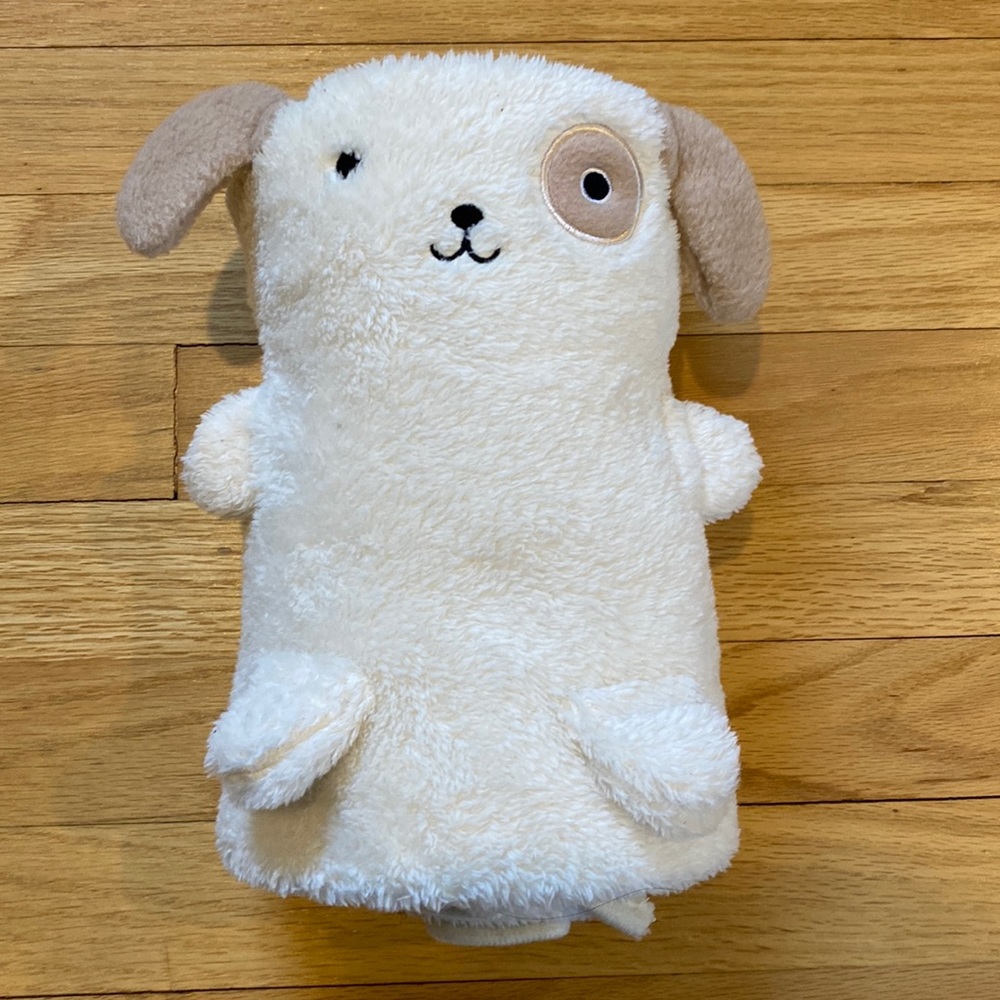 Soft rolled up puppy baby blanket
